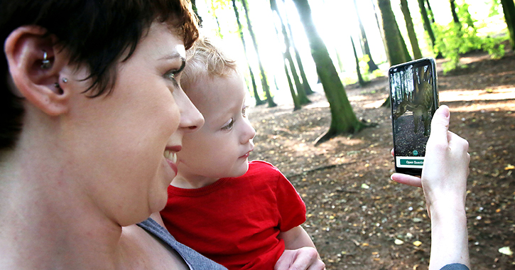 Mother and son using the Love Exploring App in Hardwick Park.